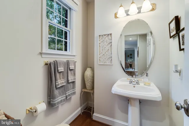 an aerial view of a house with yard swimming pool and outdoor seating