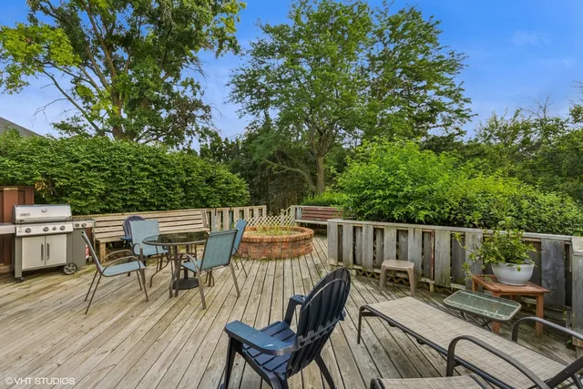 a view of a patio with couple of chairs
