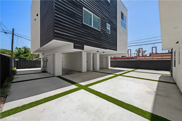 a bathroom with a sink vanity and toilet