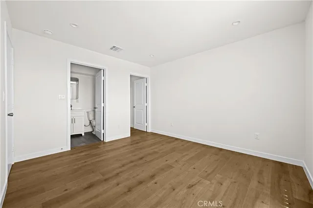a bathroom with a sink mirror bathtub and toilet