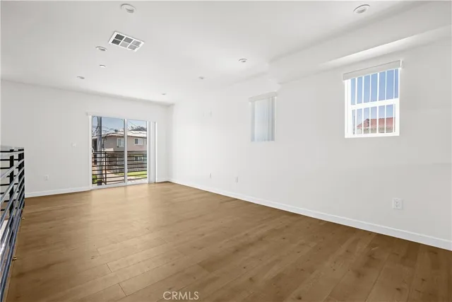a bathroom with a sink toilet and mirror