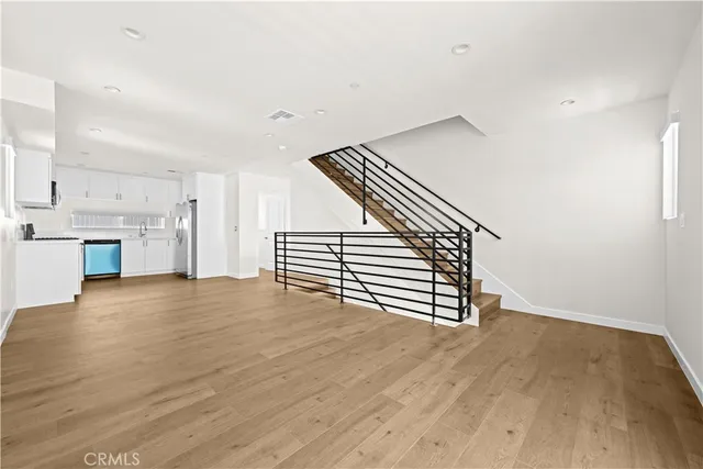 a view of livingroom with washer and dryer