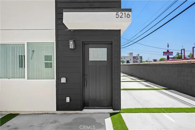 a view of a building with brick walls