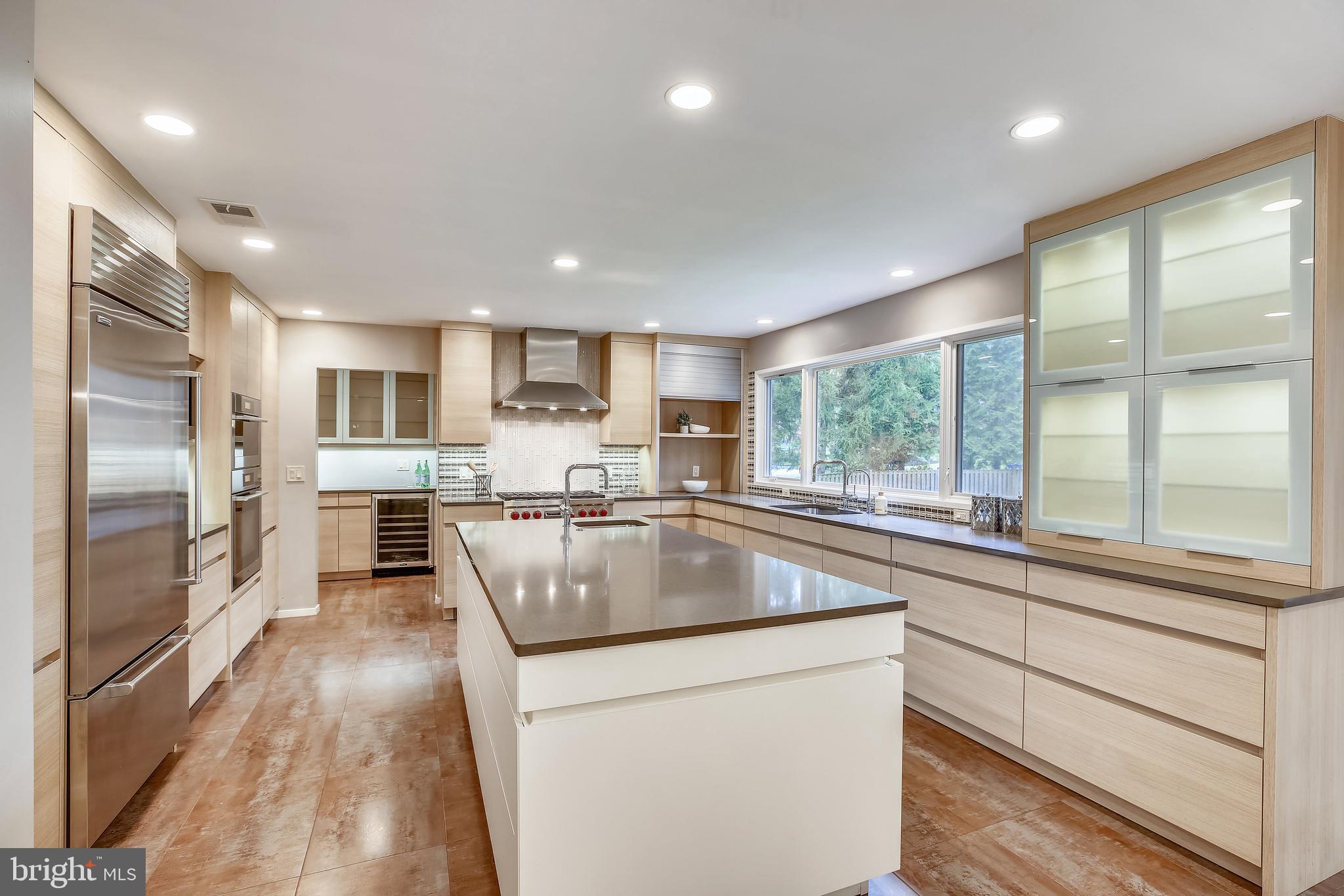 7903 Springer Road Bethesda, MD 20817 - Photo 19 of 83 Lighted glass front cabinets, w/organizer inserts
