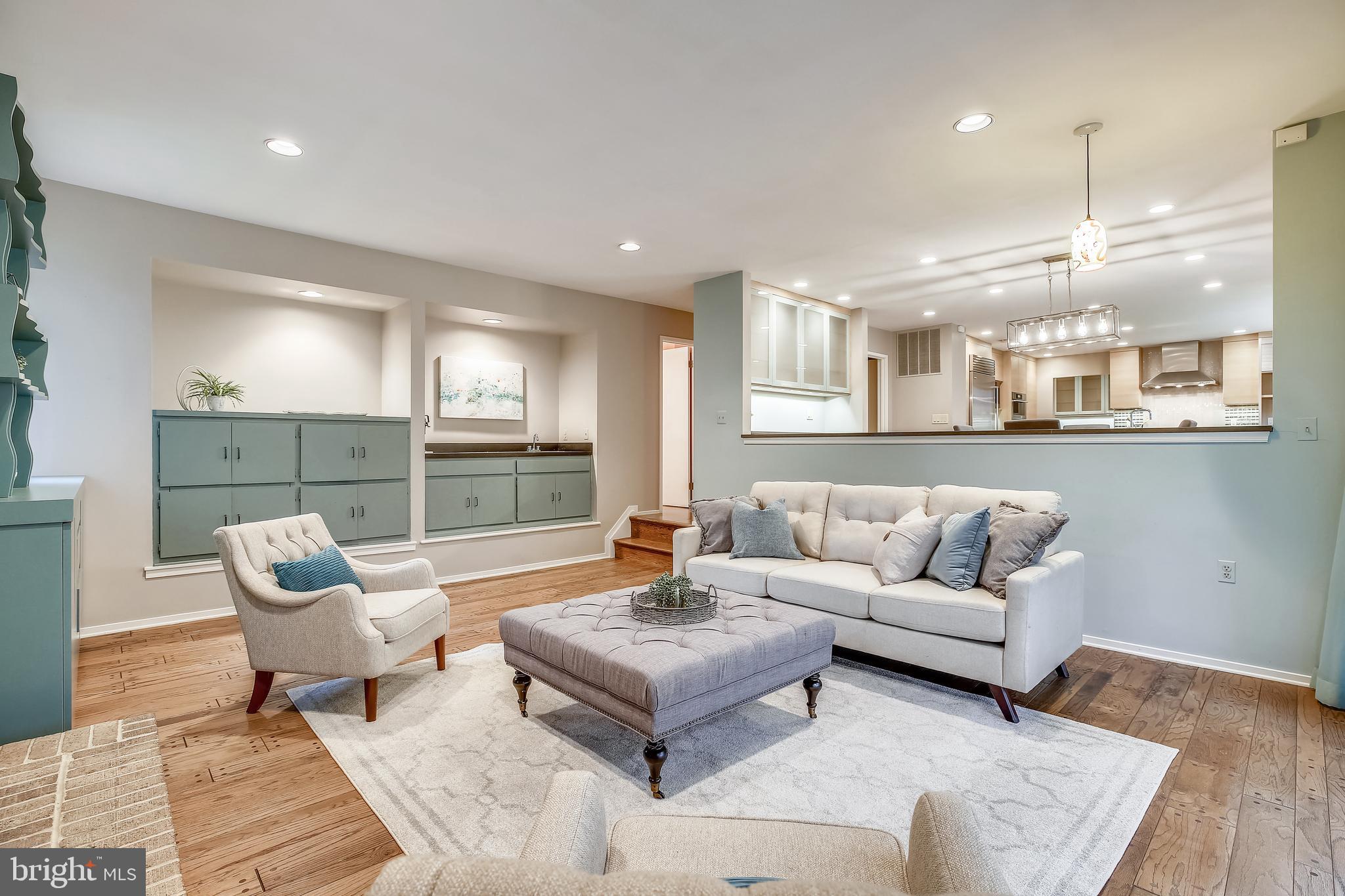 7903 Springer Road Bethesda, MD 20817 - Photo 25 of 83 custom built-ins and wet bar in famiy room