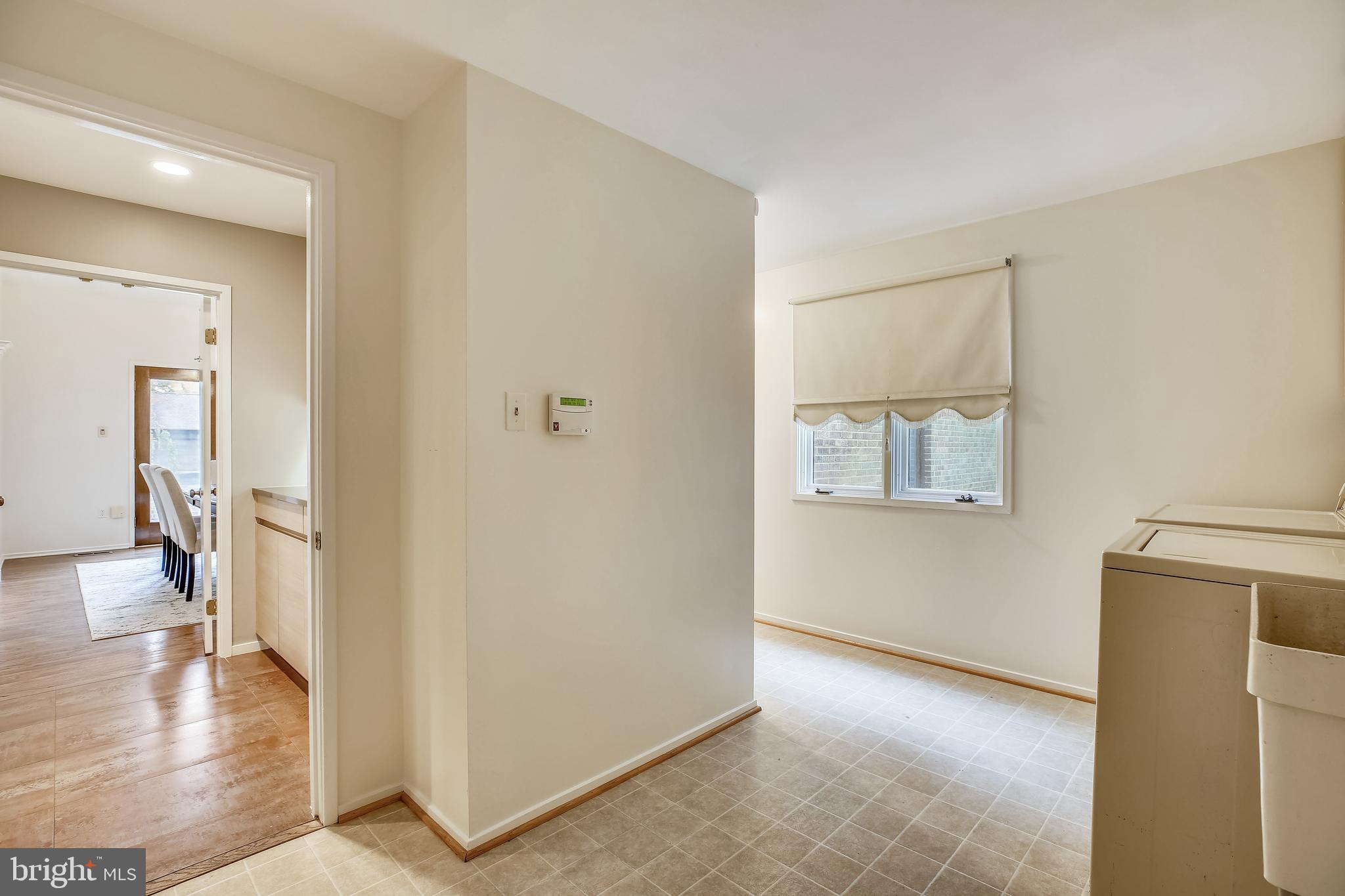 7903 Springer Road Bethesda, MD 20817 - Photo 34 of 83 Laundry/Mud Room (closet & garage to L of window)