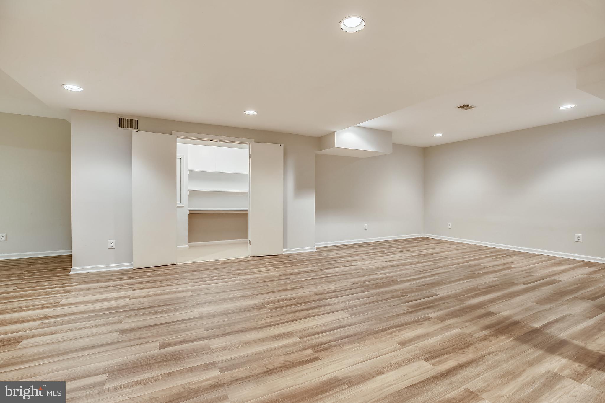7903 Springer Road Bethesda, MD 20817 - Photo 62 of 83 big walk-in closet w/shelving for toys & games