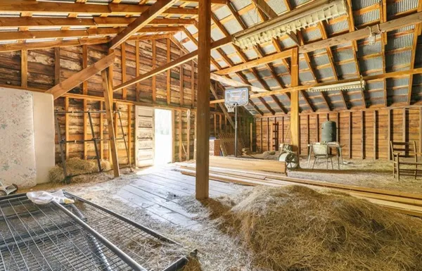 a view of a hall with a couch