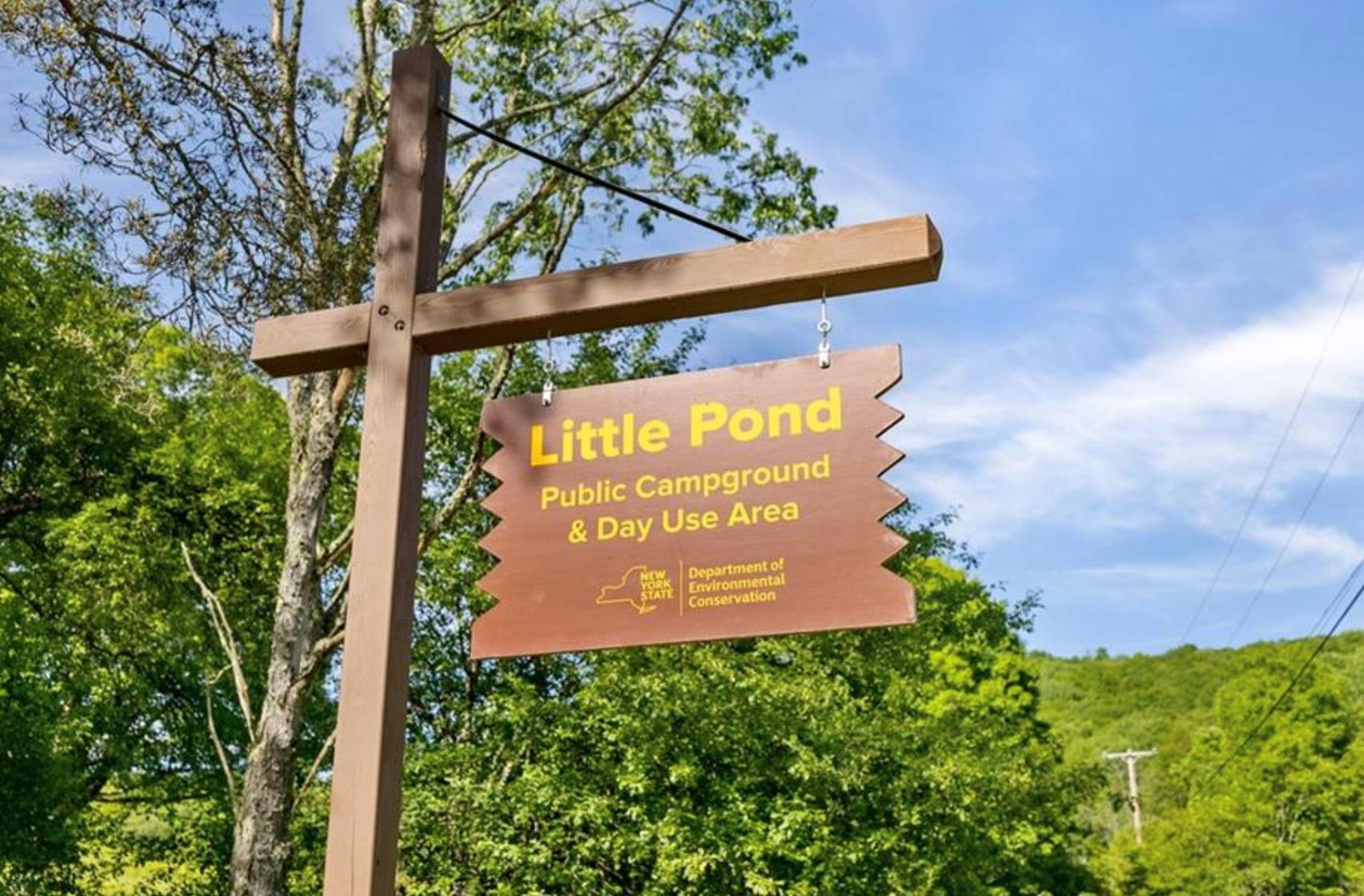 2018 Beaverkill Road Livingston Manor, NY 12758 - Photo 23 of 30 a sign that is sitting on a brick wall