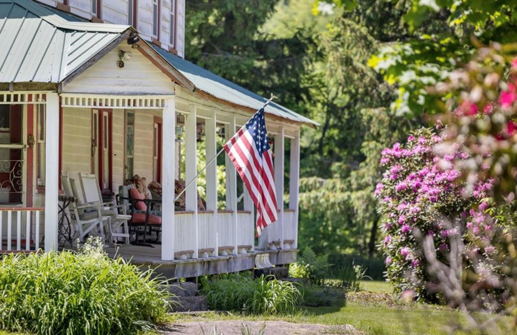 2018 Beaverkill Road Livingston Manor, NY 12758 - Photo 6 of 30 a view of small house along with yard and outdoor seating