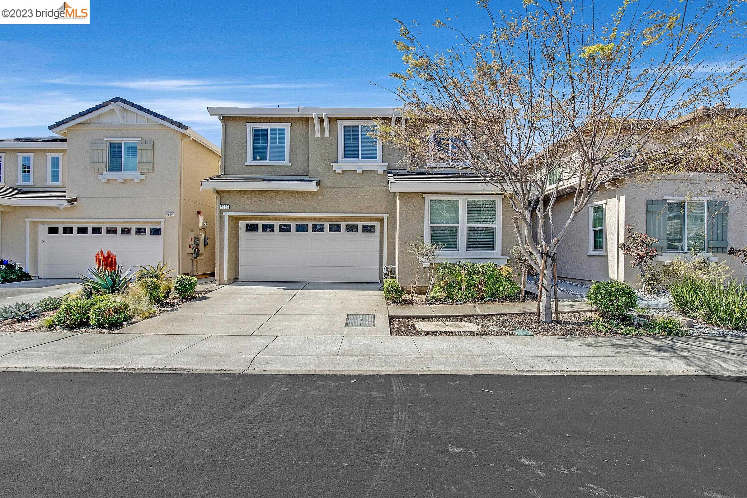 front view of house with a yard