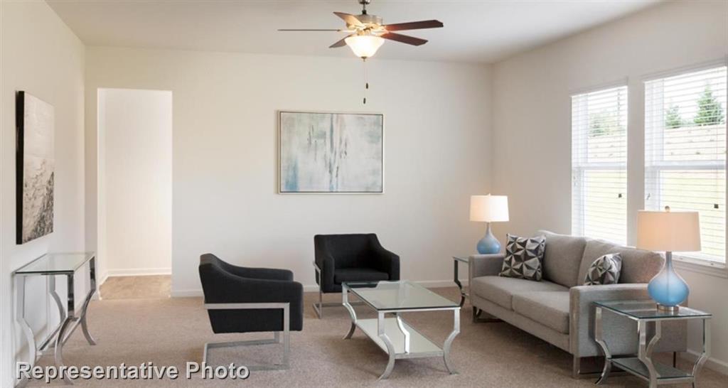 1409 Kennedy Road Howe, TX 75459 - Photo 4 of 6 a living room with furniture a rug and a window