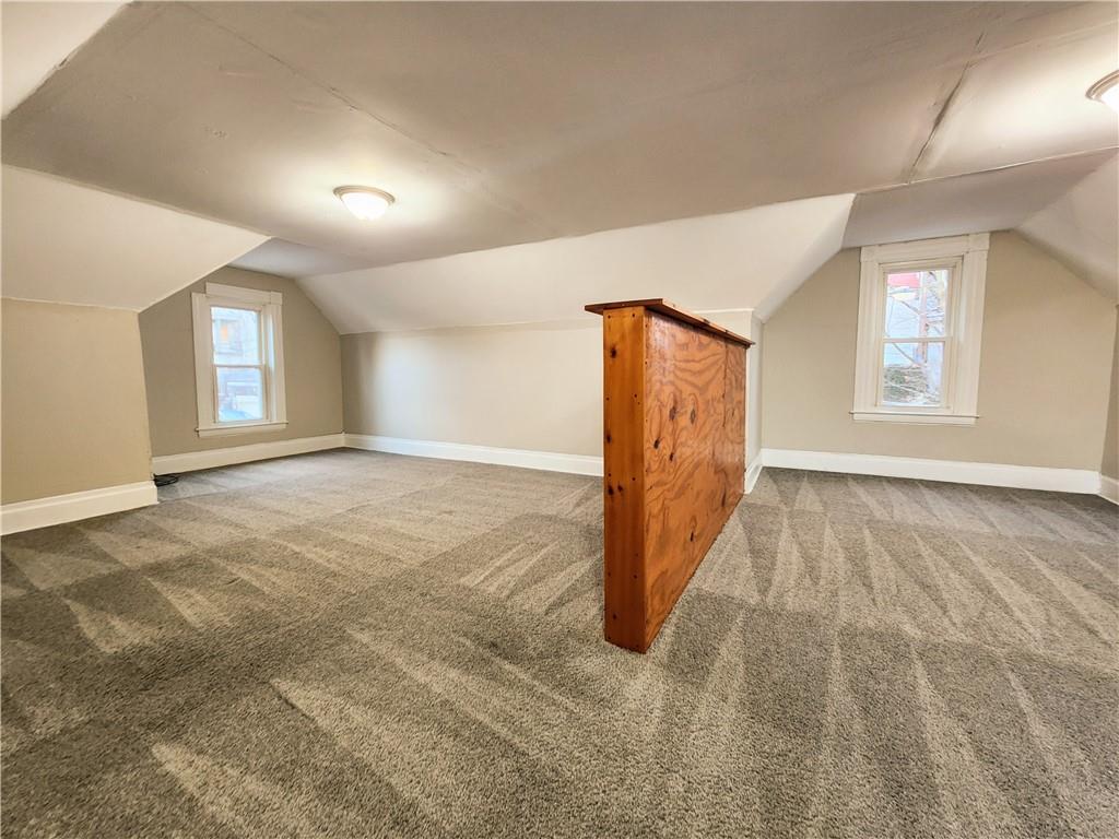 124 Cutler Street McKees Rocks, PA 15136 - Photo 2 of 9 an empty room with windows and closet