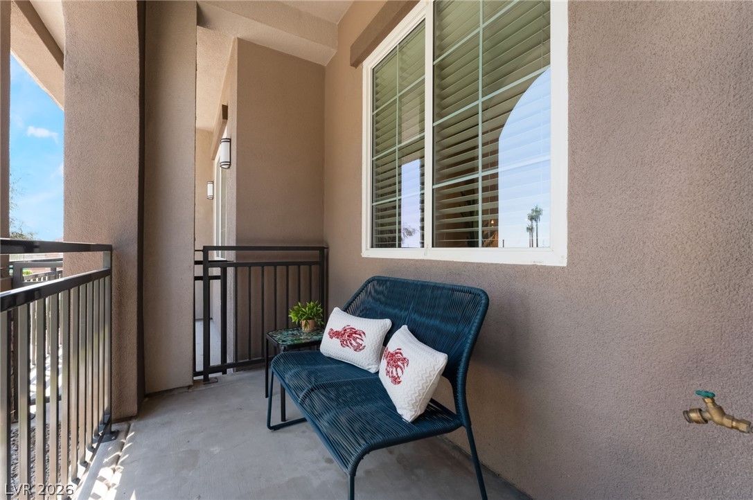 6432 Spring Jog Street Las Vegas, NV 89166 - Photo 5 of 61 A tranquil covered patio offers an inviting outdoor retreat for relaxation.