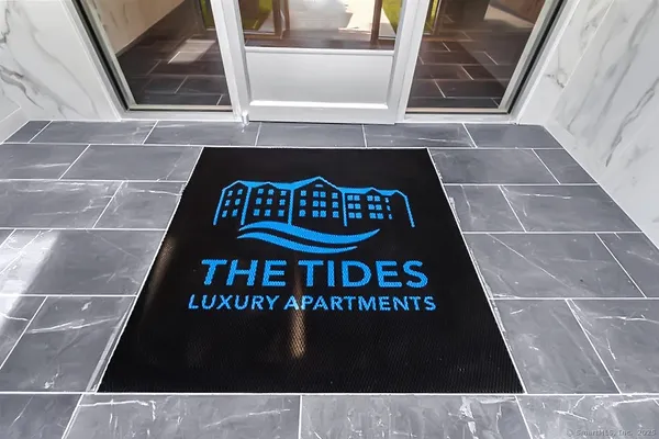 a picture of a bench in front of a window