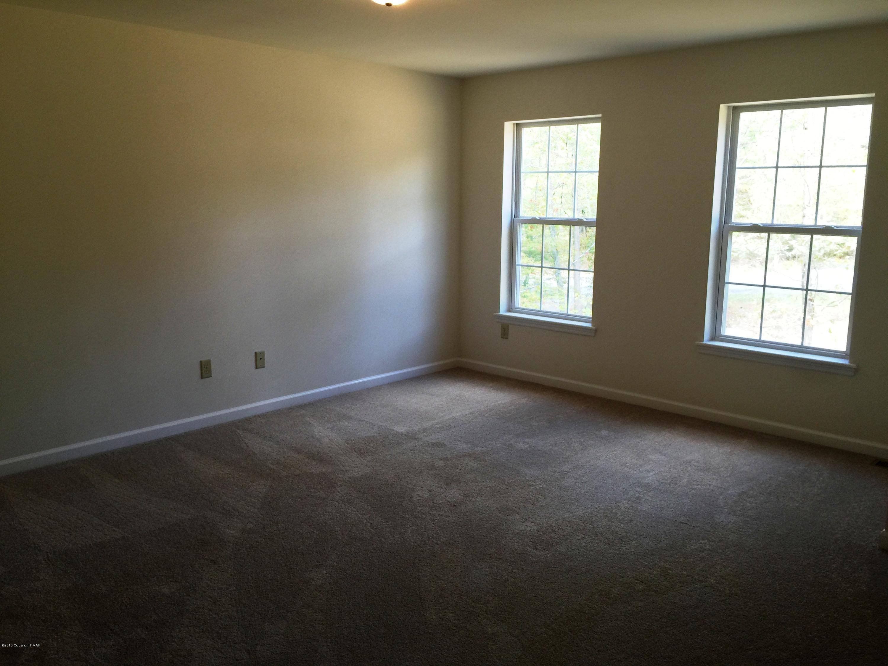 168 Whitetail Road Henryville, PA 18332 - Photo 16 of 28 an empty room with a window