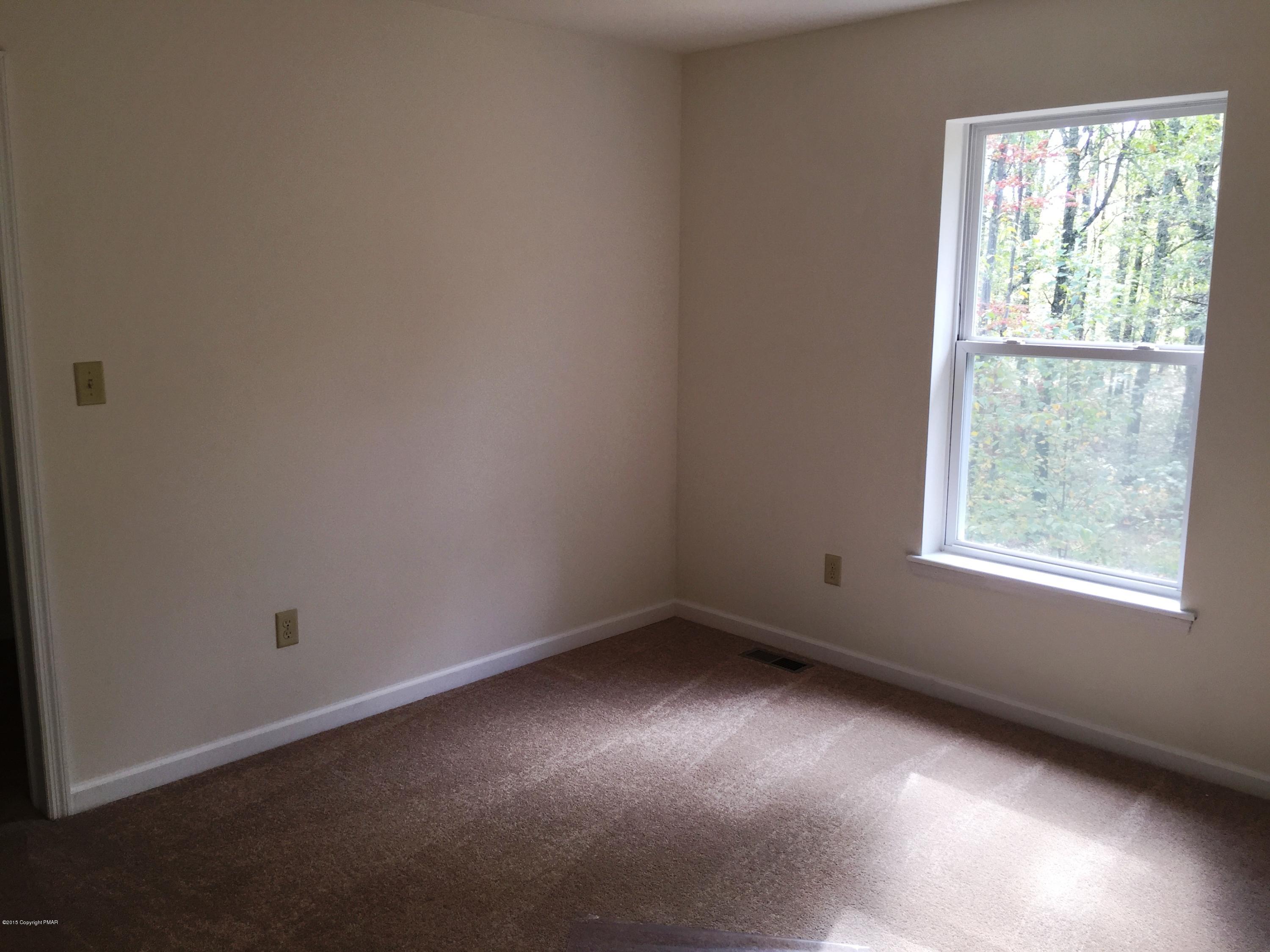 168 Whitetail Road Henryville, PA 18332 - Photo 20 of 28 an empty room with a window