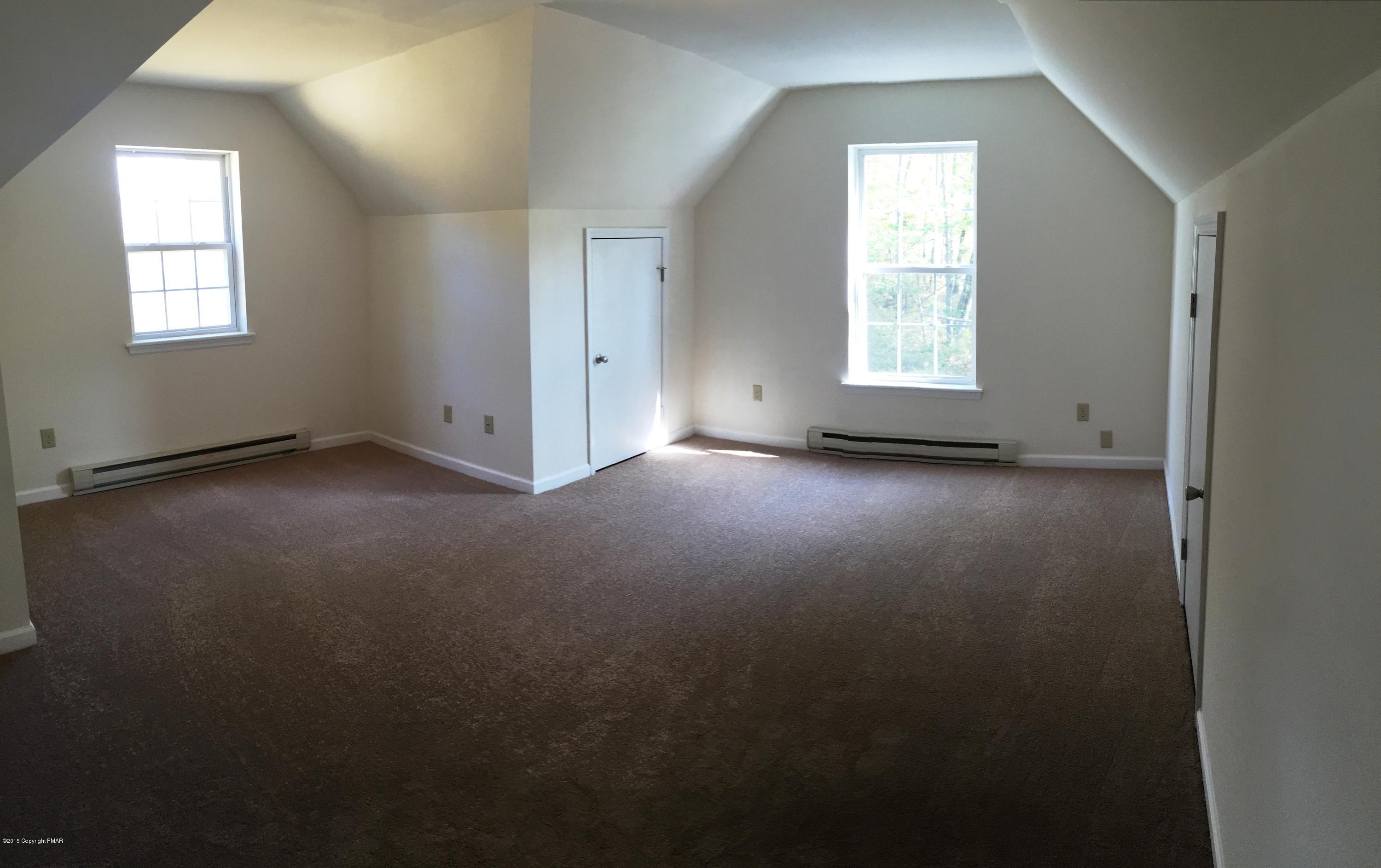 168 Whitetail Road Henryville, PA 18332 - Photo 21 of 28 an empty room with windows and closet