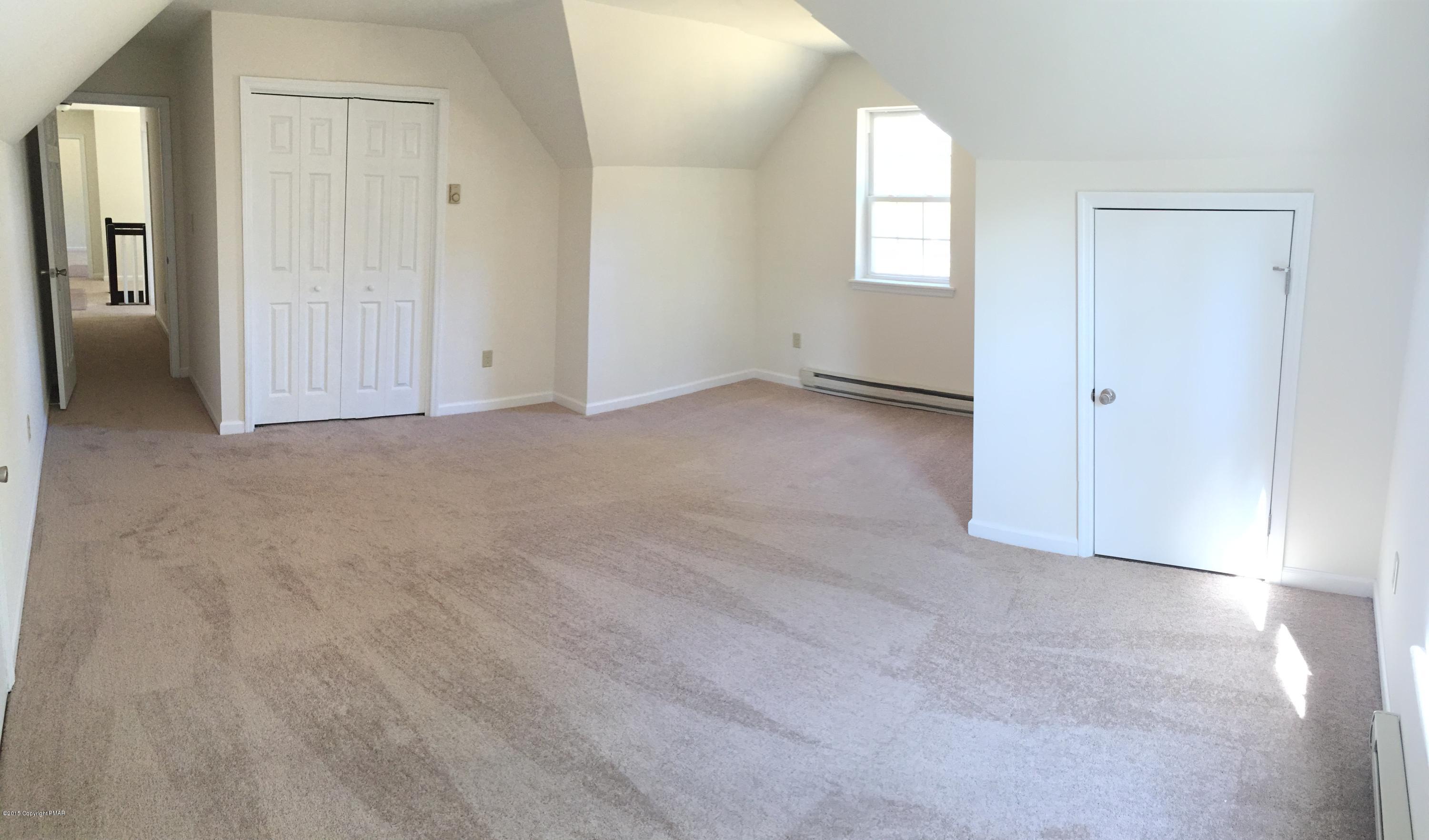 168 Whitetail Road Henryville, PA 18332 - Photo 22 of 28 an empty room with windows and closet