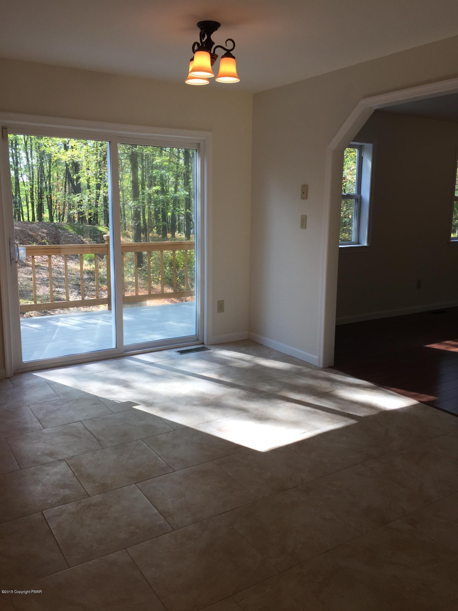 168 Whitetail Road Henryville, PA 18332 - Photo 6 of 28 a view of an empty room with a window
