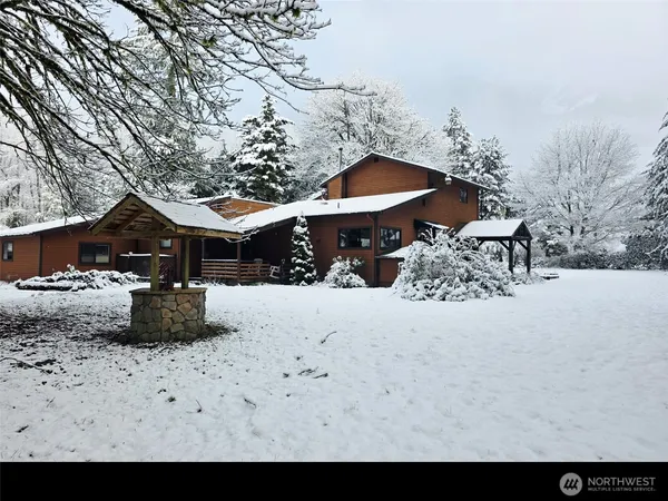 a view of a backyard of a house