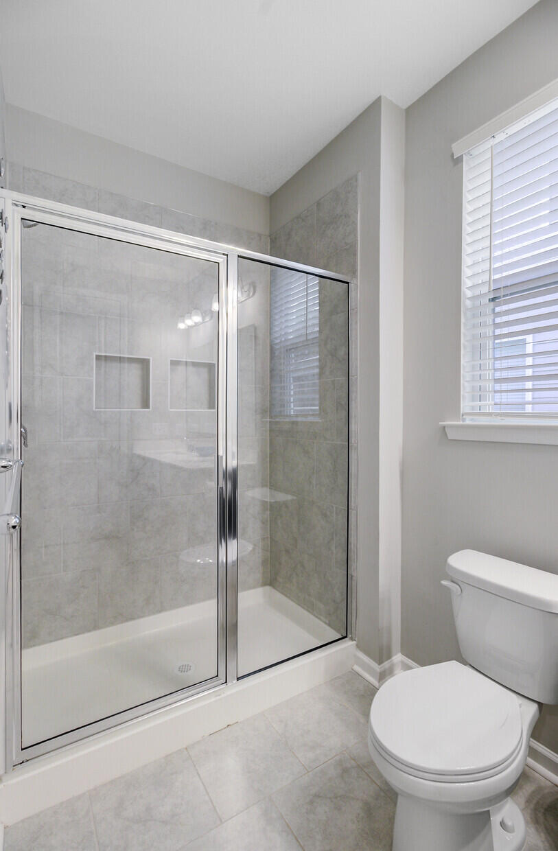 1038 Magnolia Warbler Way Ravenel, SC 29470 - Photo 18 of 51 19. Primary bathroom shower