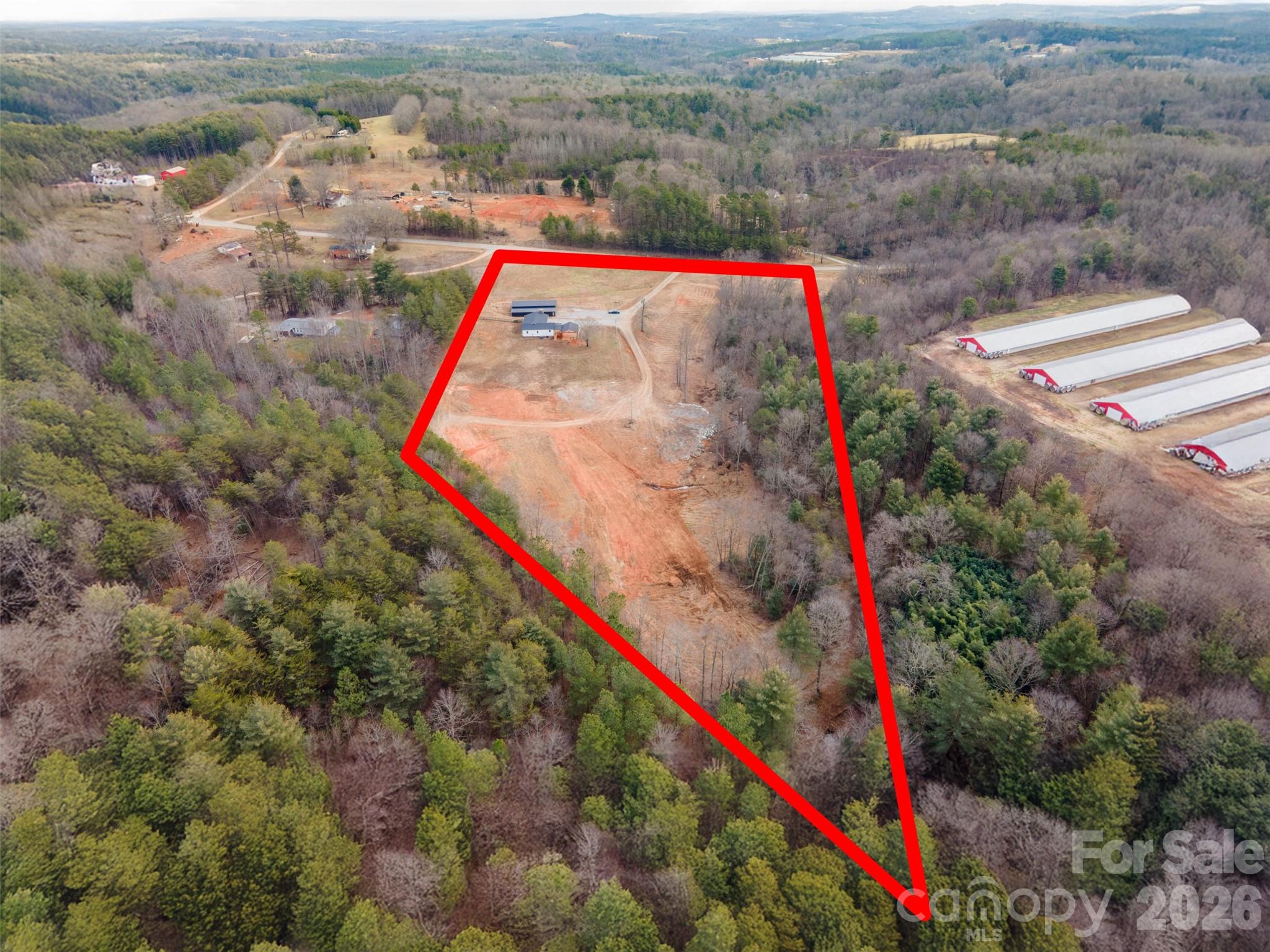 7400 Corn Hill Road Connelly Springs, NC 28612 - Photo 41 of 41 an aerial view of residential houses with outdoor space