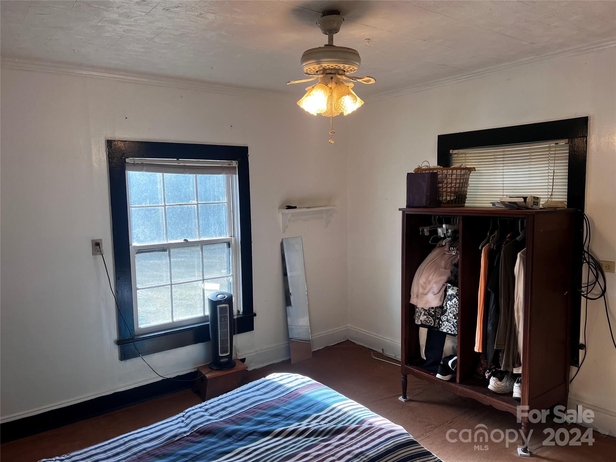 655 Lippard Road Salisbury, NC 28146 - Photo 17 of 18 a view of walk in closet with clothes and shoes