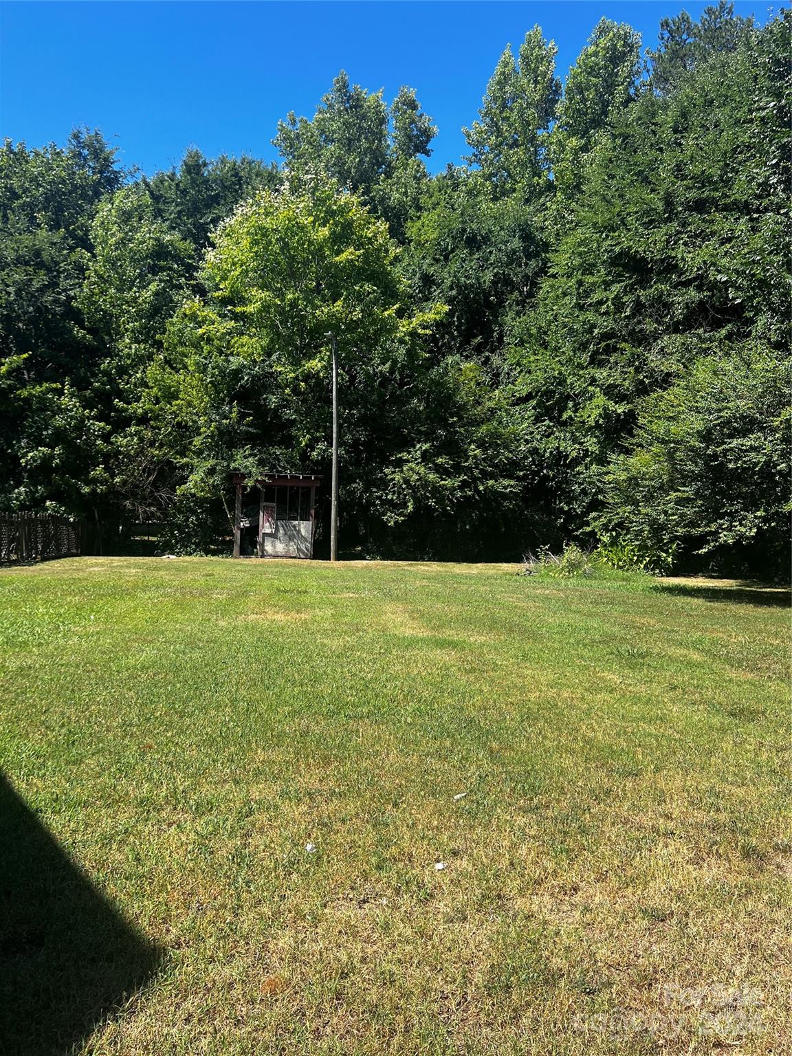655 Lippard Road Salisbury, NC 28146 - Photo 3 of 18 a view of green field with trees