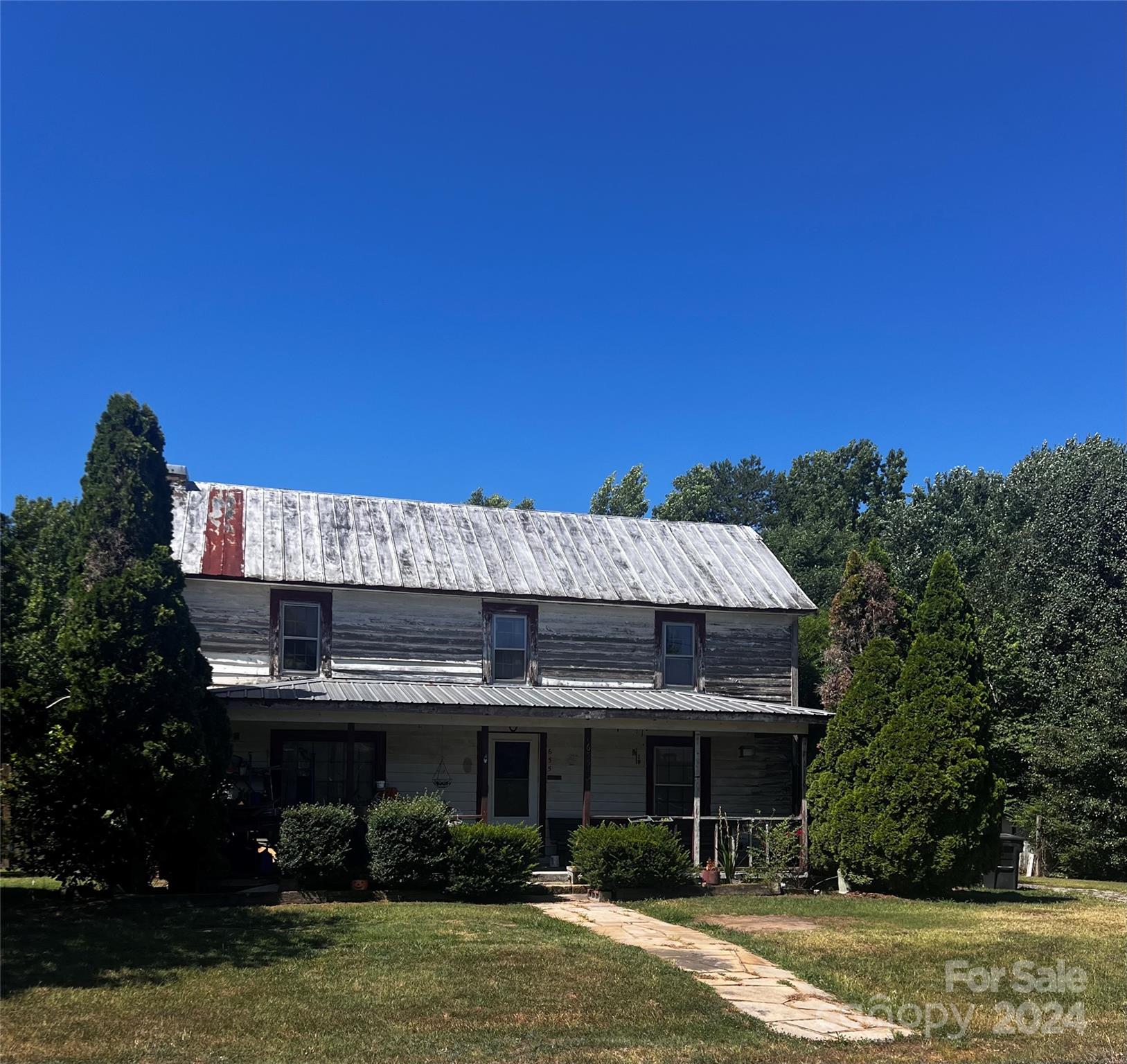 655 Lippard Road Salisbury, NC 28146 - Photo 4 of 18 a front view of a house with a yard