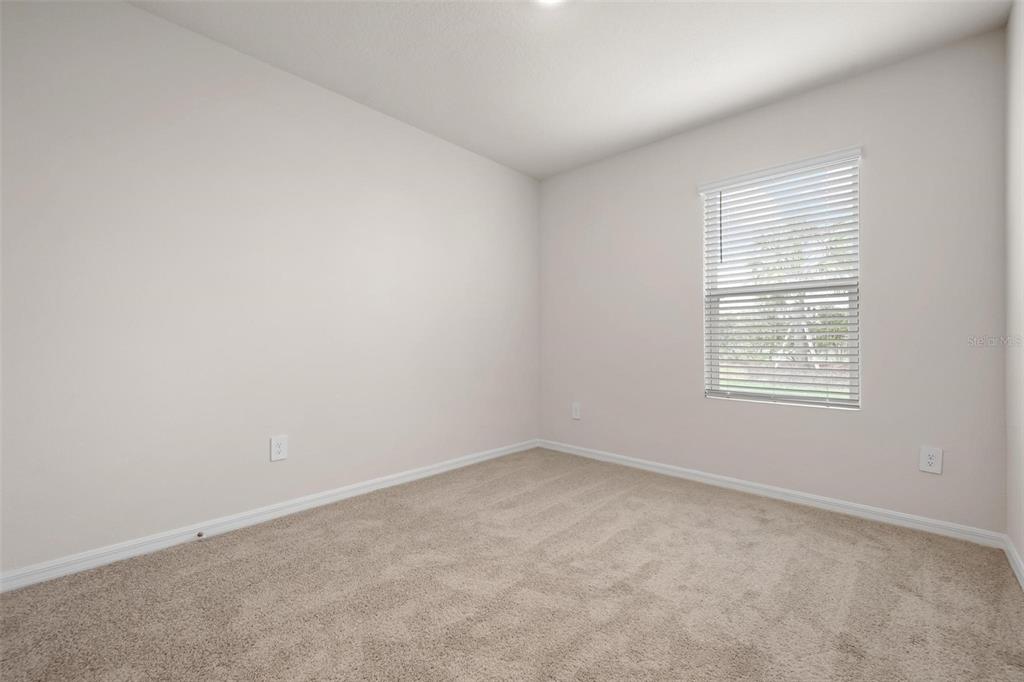 3218 Bitterroot Lane Bradenton, FL 34211 - Photo 20 of 48 an empty room with a window