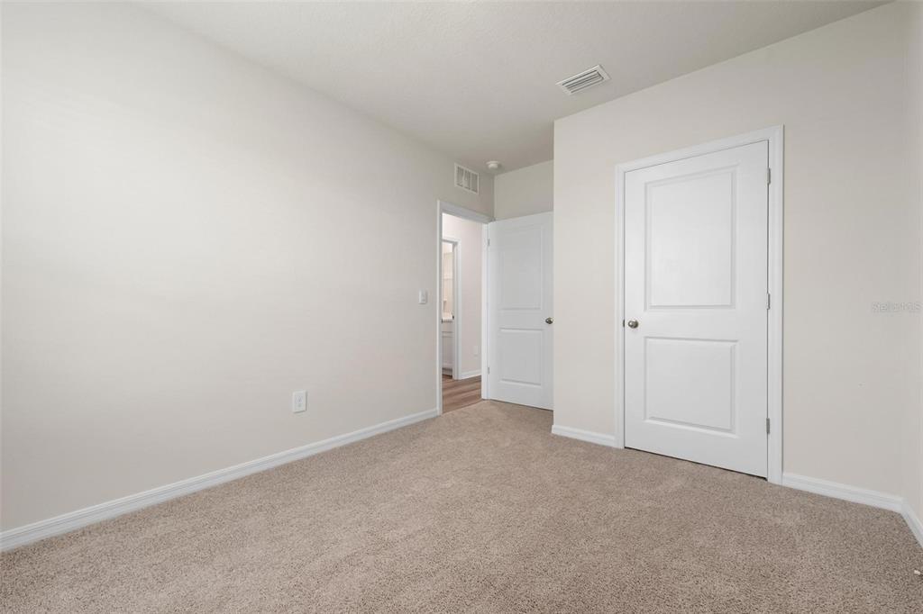 3218 Bitterroot Lane Bradenton, FL 34211 - Photo 21 of 48 a view of an empty room