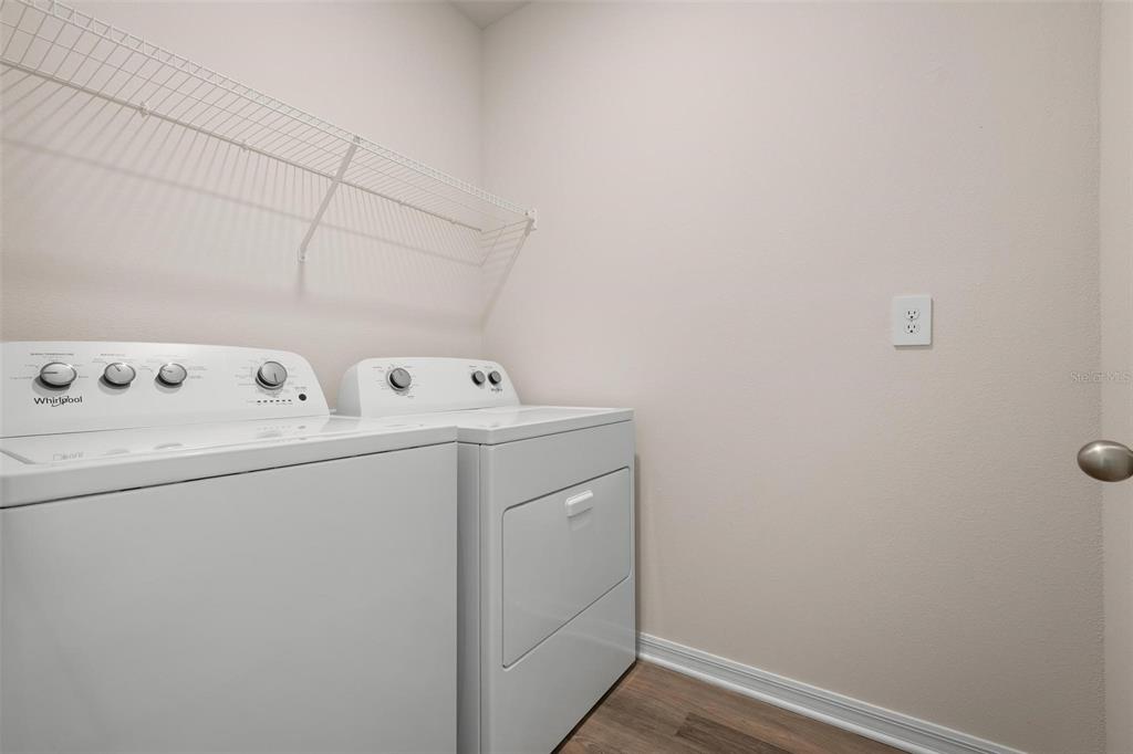 3218 Bitterroot Lane Bradenton, FL 34211 - Photo 27 of 48 a utility room with dryer and washer