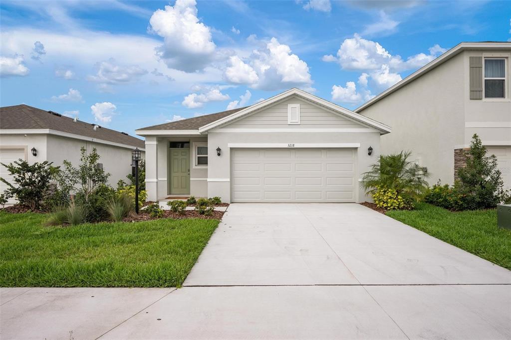 3218 Bitterroot Lane Bradenton, FL 34211 - Photo 29 of 48 a front view of house with yard