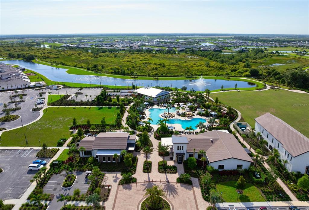 3218 Bitterroot Lane Bradenton, FL 34211 - Photo 37 of 48 an aerial view of a houses with a lake view