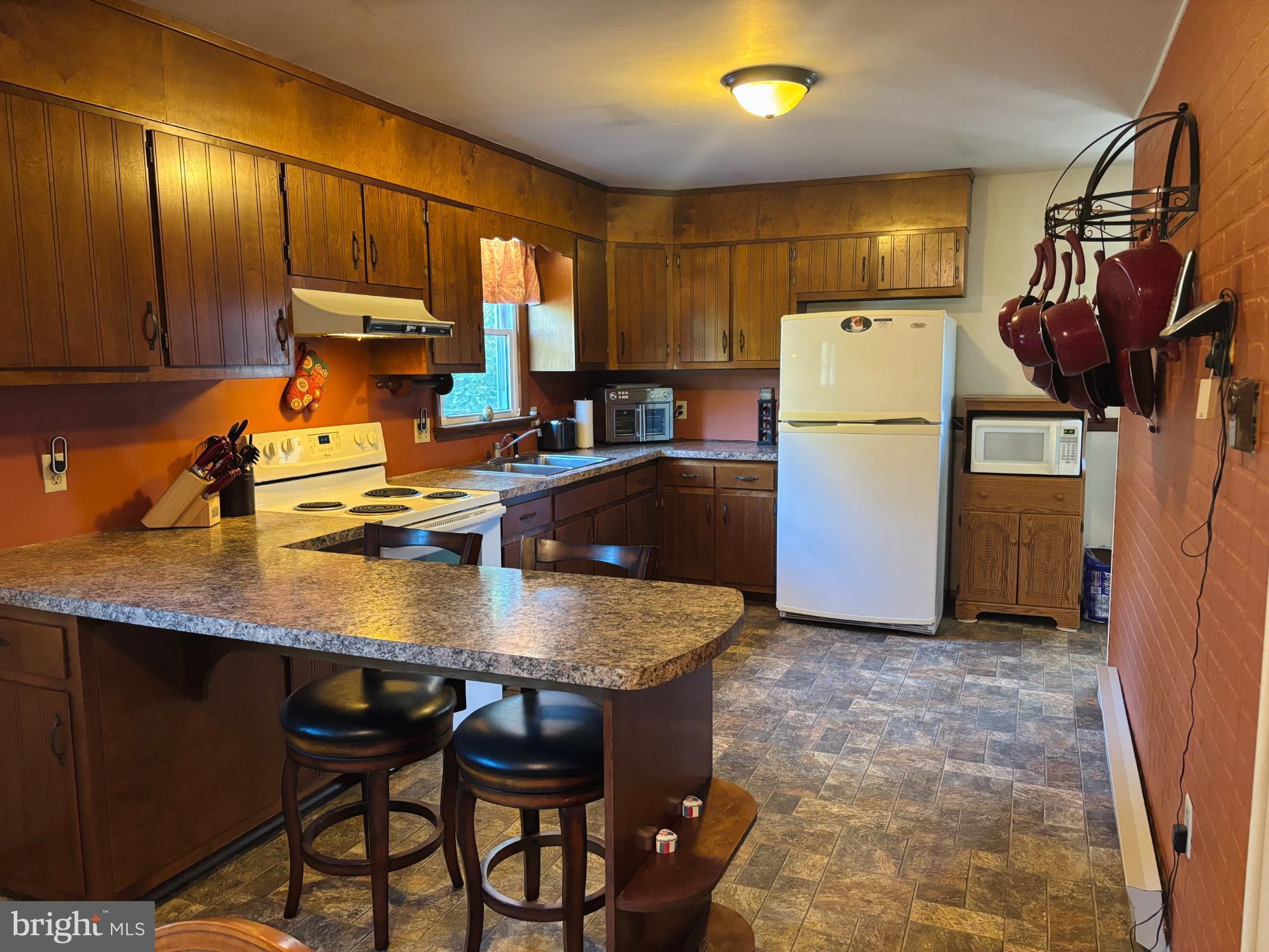 1470 Middle Road Lewistown, PA 17044 - Photo 7 of 13 Cozy kitchen with warm wooden accents.