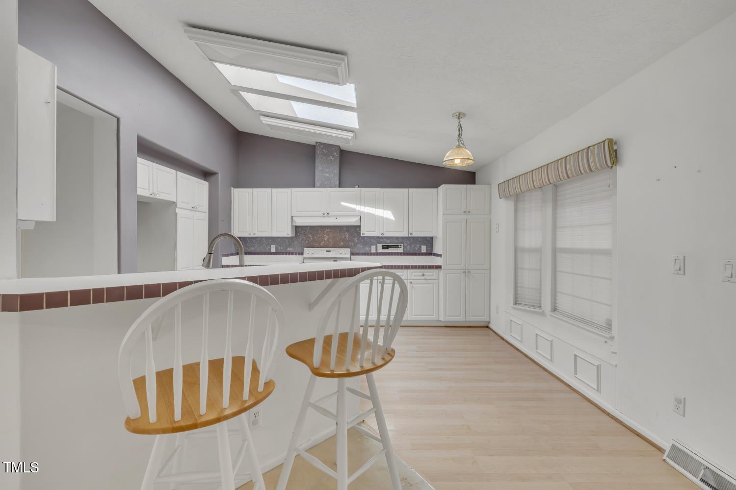 6301 Cayuse Lane Raleigh, NC 27603 - Photo 10 of 30 Kitchen has an eat-at-bar.