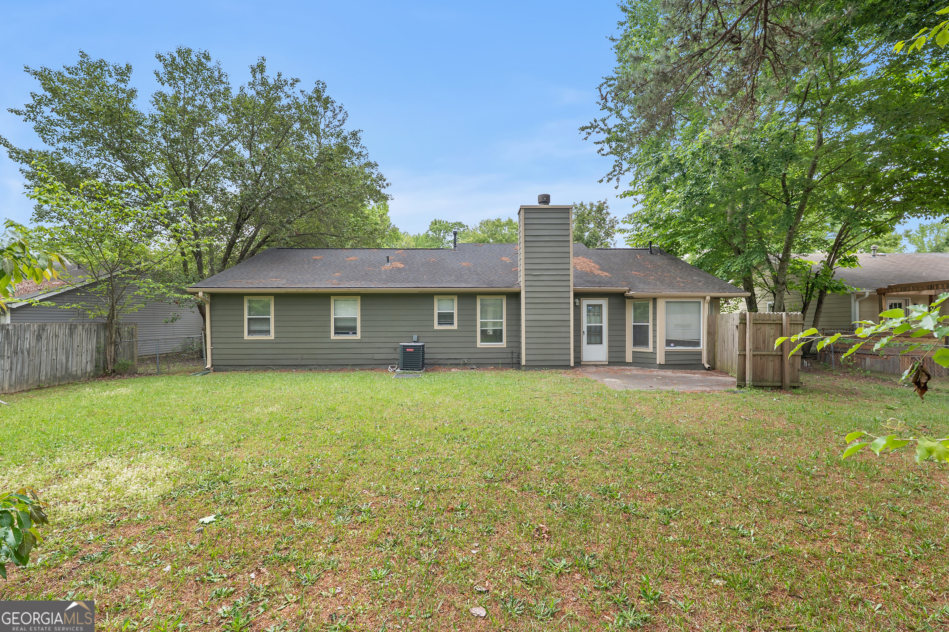 1328 Foxvale Drive Hampton, GA 30228 - Photo 26 of 27 a front view of a house with a garden
