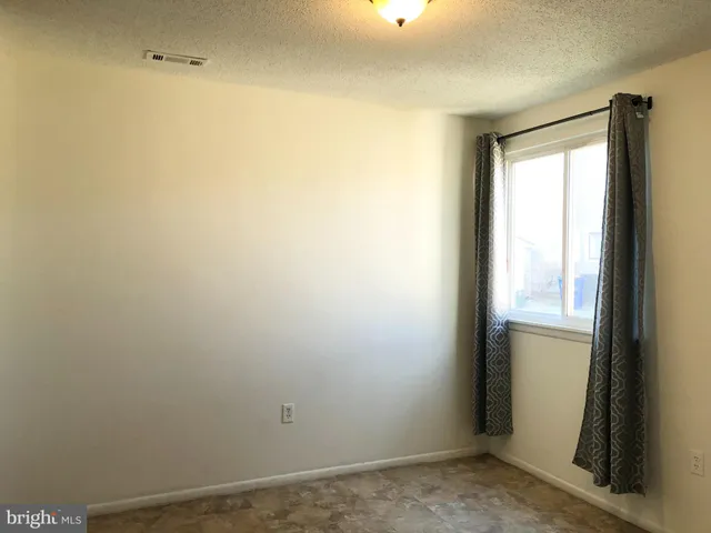 a view of a small space with a window