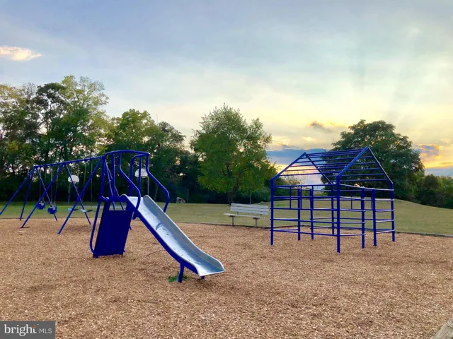 a view of a park with slide