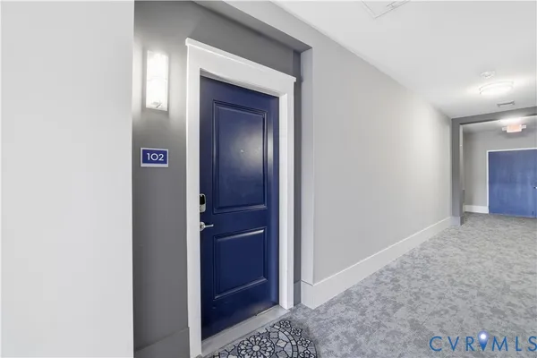 a view of a door with a lounge chair