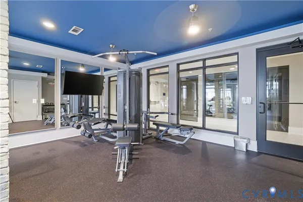 a view of a room with gym equipment
