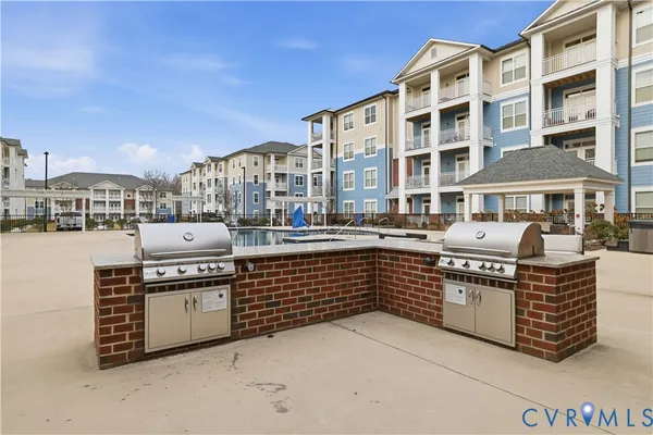 a front view of a building with many windows