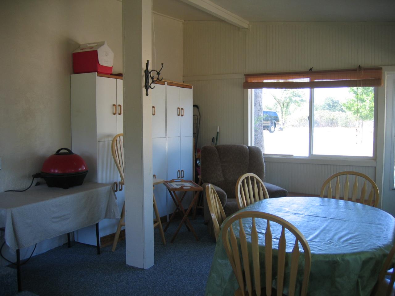 11554 Quartz Hill Road Redding, CA 96003 - Photo 24 of 28 a bedroom with a bed and a window