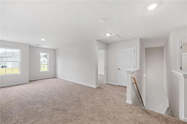 a view of empty room with front door
