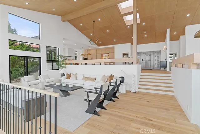 a kitchen with stainless steel appliances kitchen island granite countertop a sink and cabinets