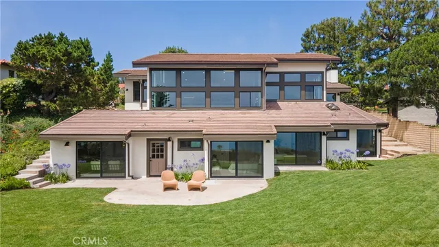 an aerial view of a houses with a outdoor space