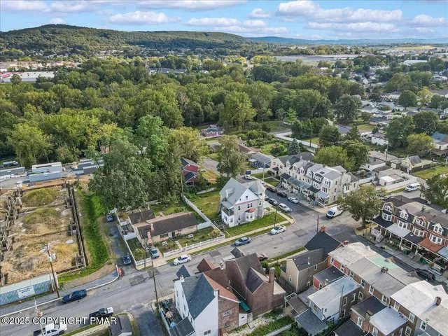 an aerial view of a city with lots of residential buildings
