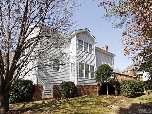 2021 Carrbridge Way Raleigh, NC 27615 - Photo 25 of 25 VIEW OF THE BACK OF THE HOUSE AND THE YARD. BRADFORD PEAR TREES ARE BEAUTIFUL IN BLOOM IN THE SPRING! Exterior Back