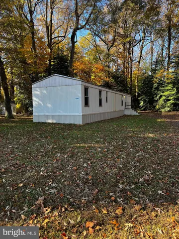 a front view of house with garden